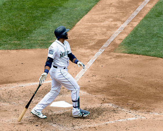 Understated.  Seattle Mariners infielder Robinson Canó's low key homerun bat flip